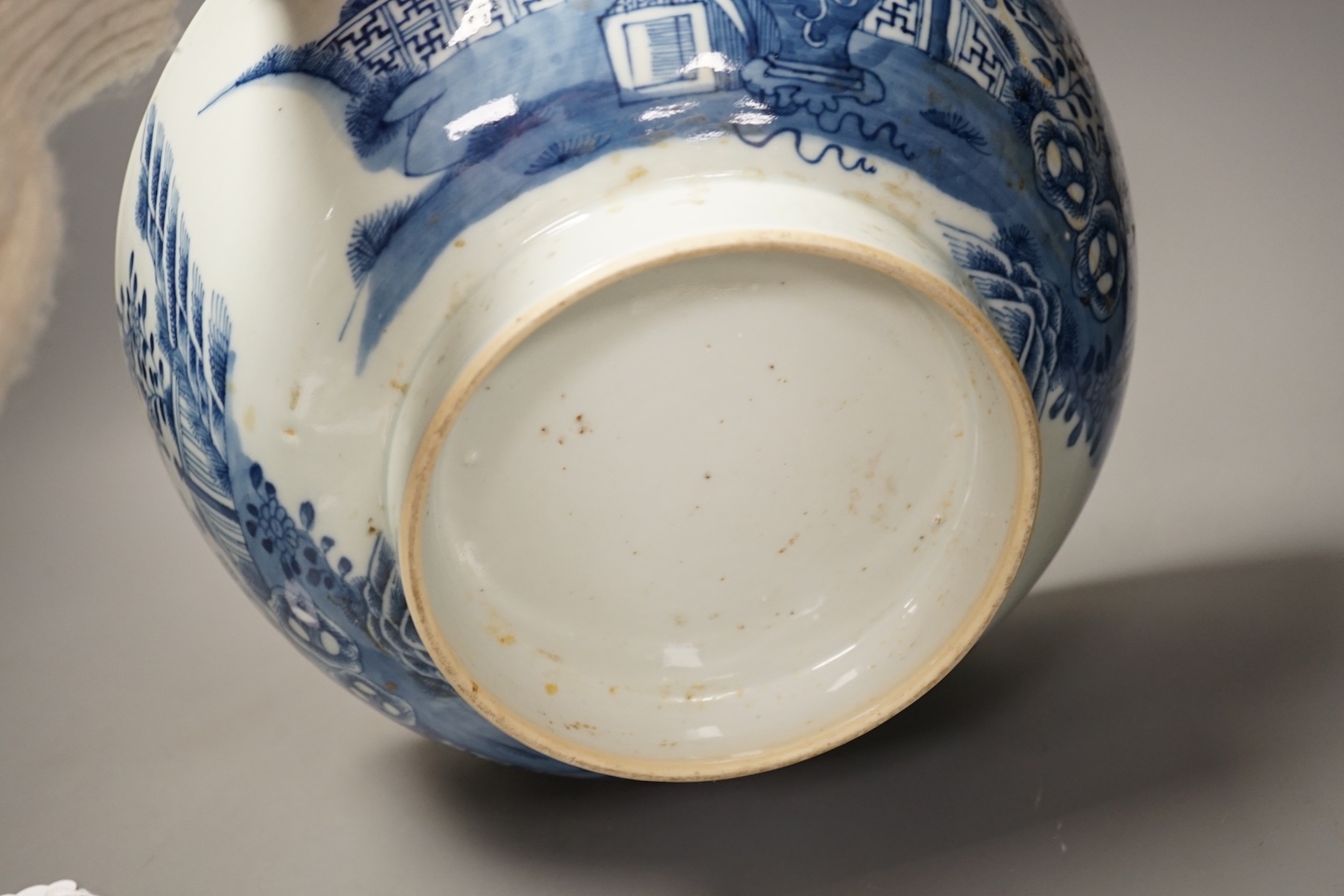An 18th century Chinese blue and white punch bowl and similar plate. Largest 29cm